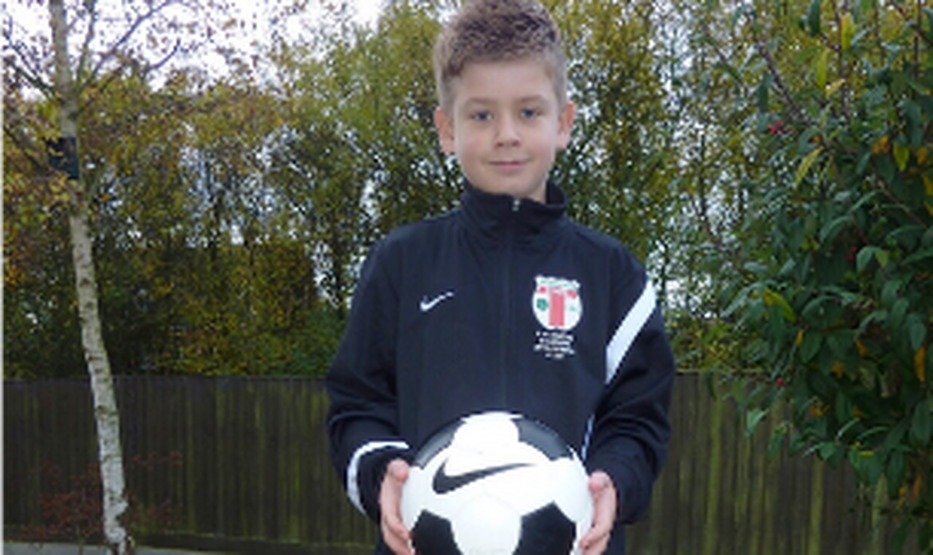 Dan with a football
